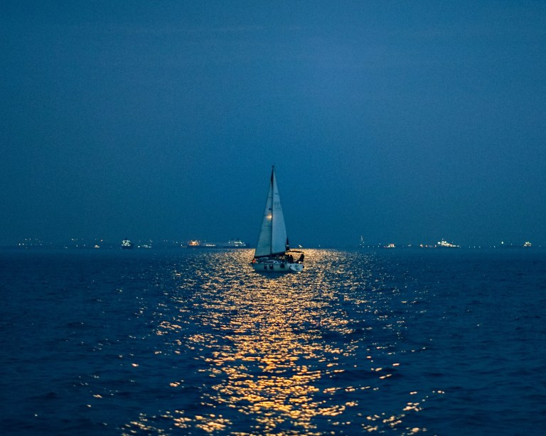 cover image of the 2.5h Full Moon sailing experience in Sotogrande Boat floating above the flash and unfurling sails