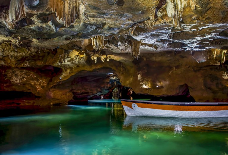 From Valencia: Boat ride through the impressive Caves of Sant Josep.