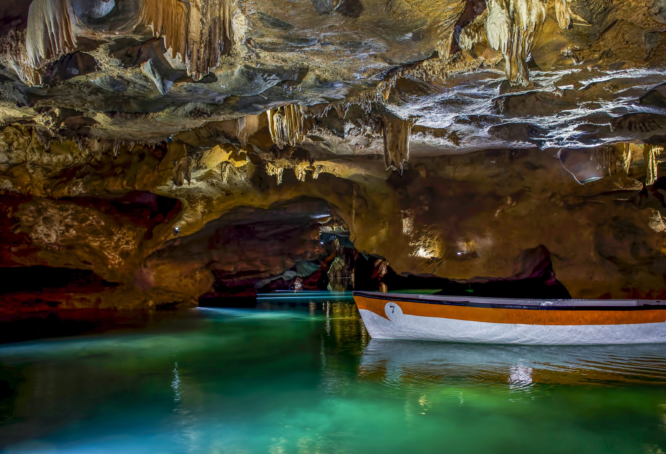 From Valencia: Boat ride through the impressive Caves of Sant Josep.