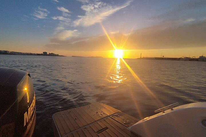 Private Boat Tour of San Antonio with Paddel surfing and Snorkeling
