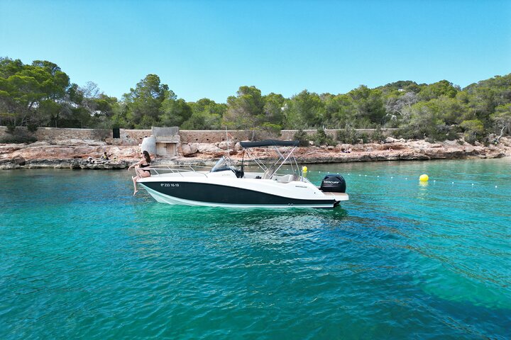 Private Boat Tour of San Antonio with Paddel surfing and Snorkeling